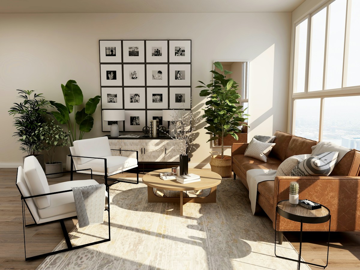 Sunlit residential interior with comfortable seating and framed photographs